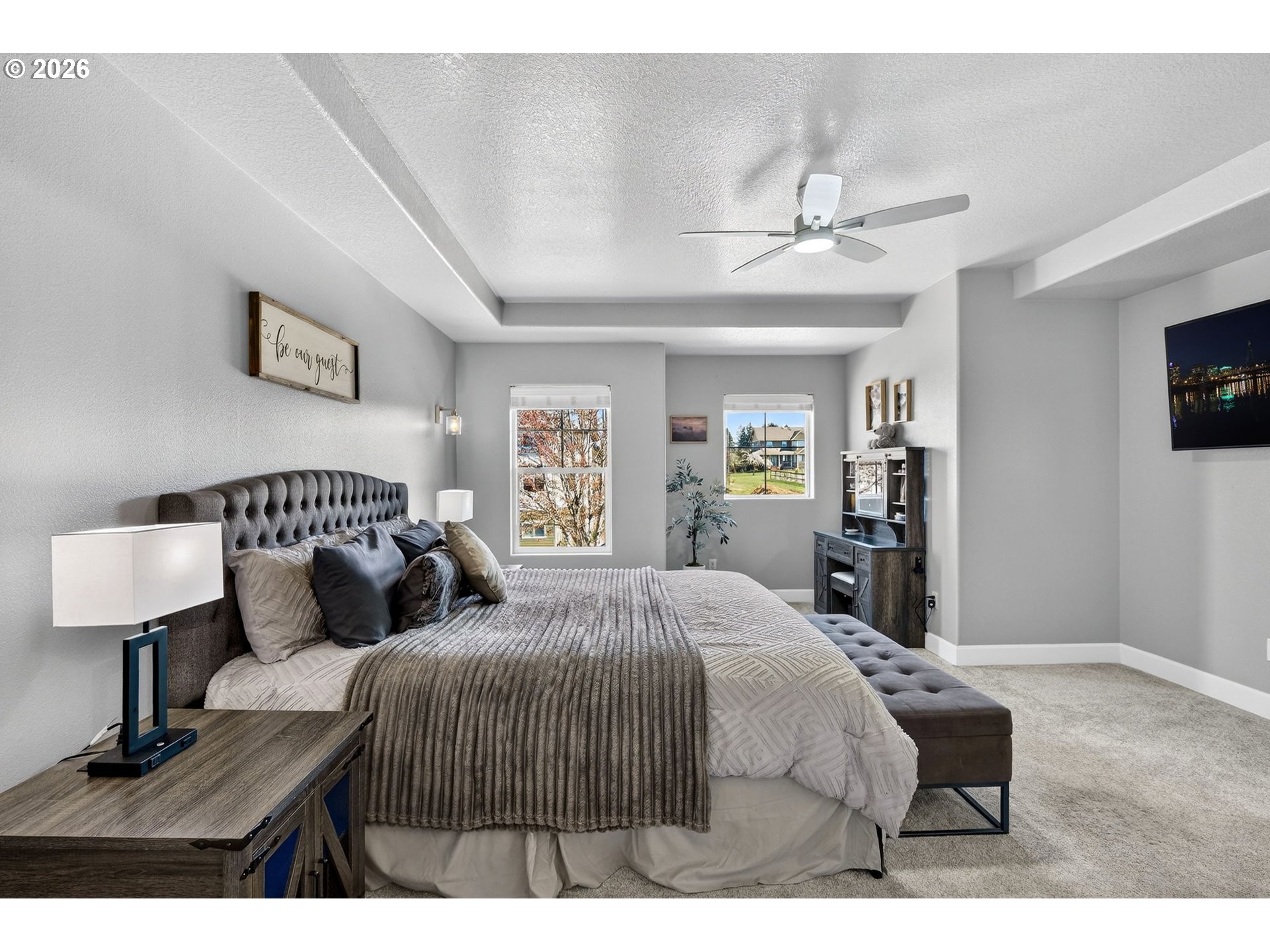 19135 Southeast Village Boulevard Sandy, OR 97055 - Photo 21 of 43 a bedroom with a bed and a lamp