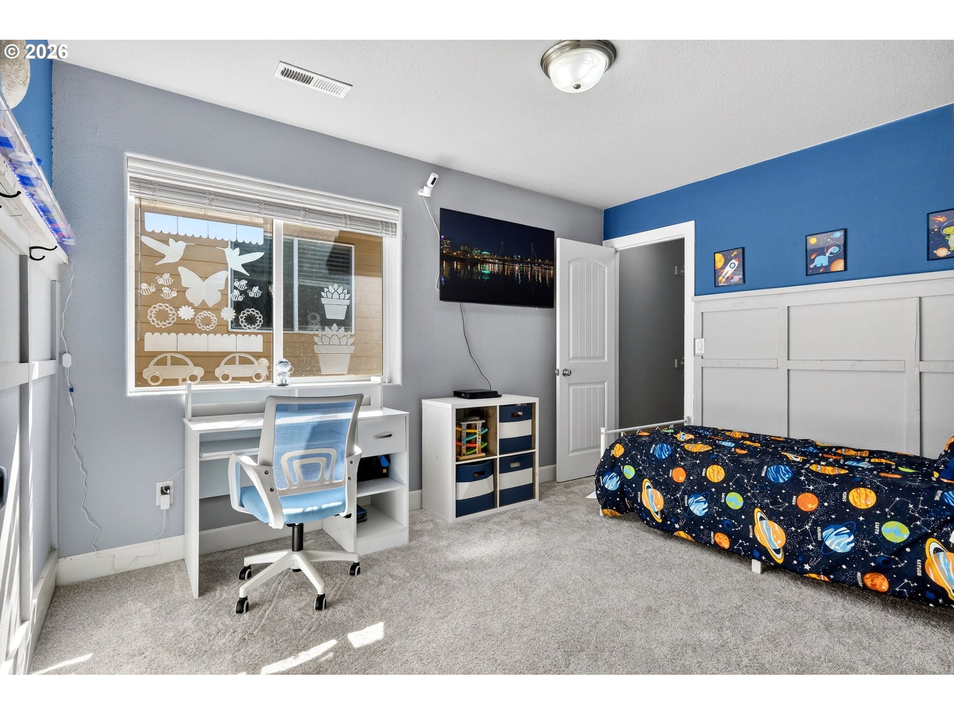 19135 Southeast Village Boulevard Sandy, OR 97055 - Photo 26 of 43 a bedroom with furniture and a window