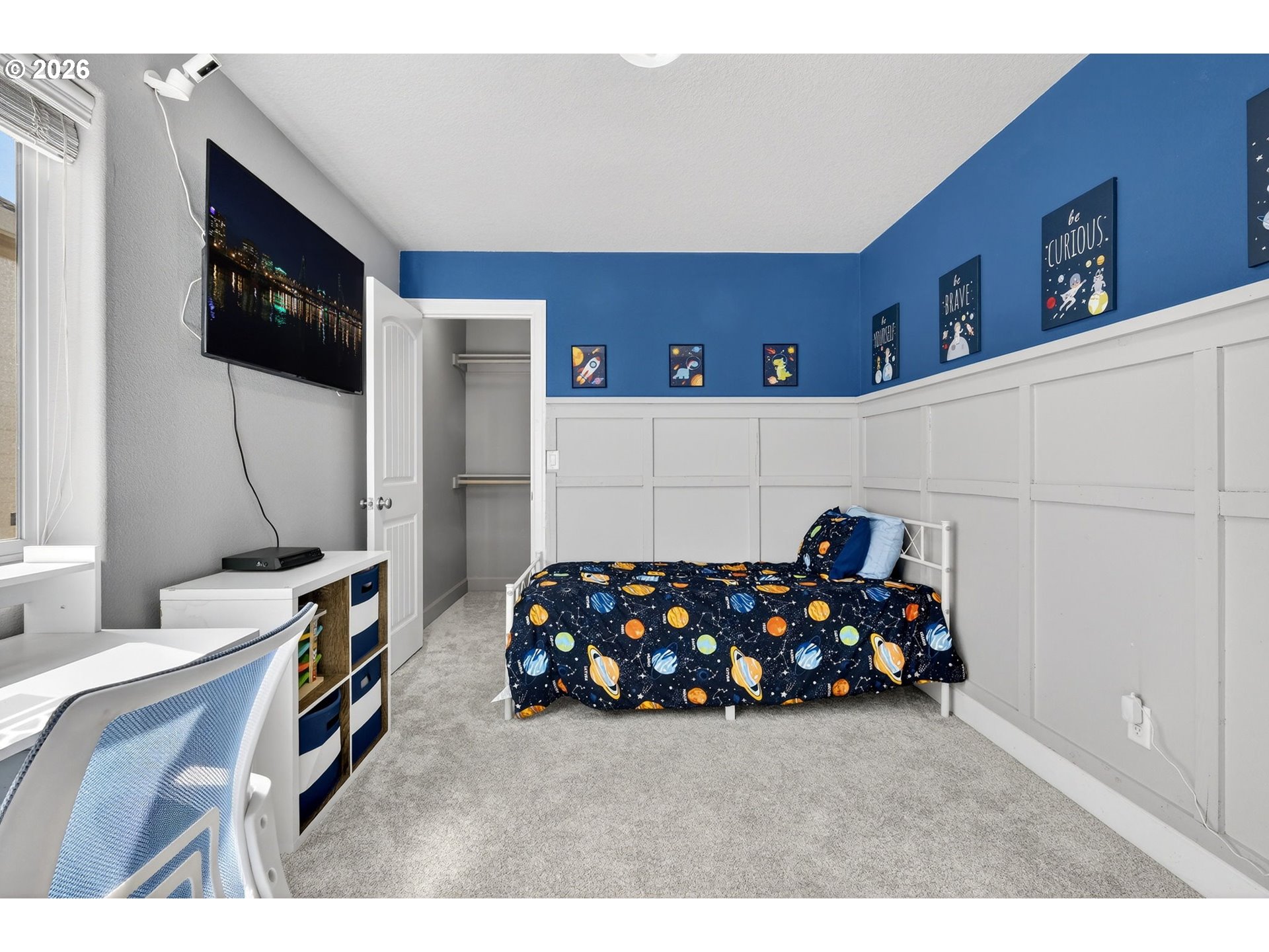 19135 Southeast Village Boulevard Sandy, OR 97055 - Photo 27 of 43 a bedroom with furniture and a flat tv screen