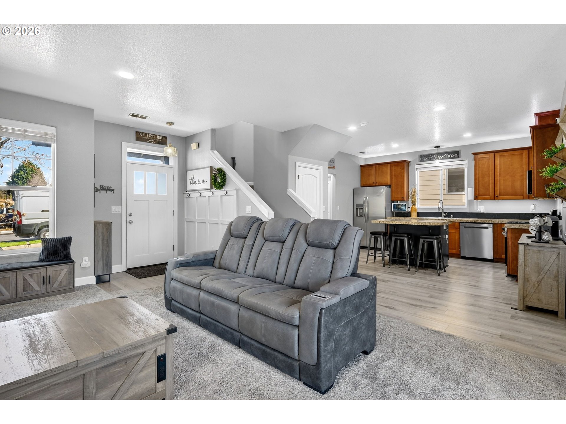 19135 Southeast Village Boulevard Sandy, OR 97055 - Photo 10 of 43 a living room with furniture and kitchen view