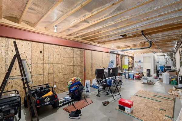 a view of a bike storage area with furniture