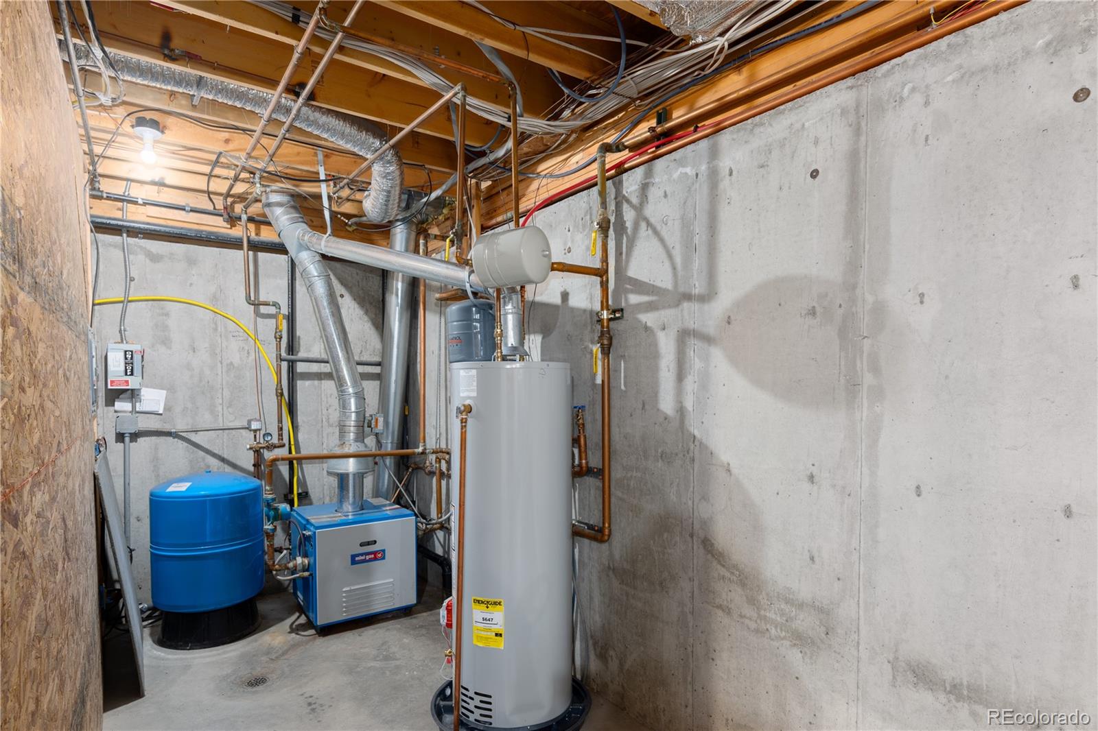 20065 Spring Creek Road Buffalo Creek, CO 80425 - Photo 34 of 41 a utility room with lots of wooden furniture