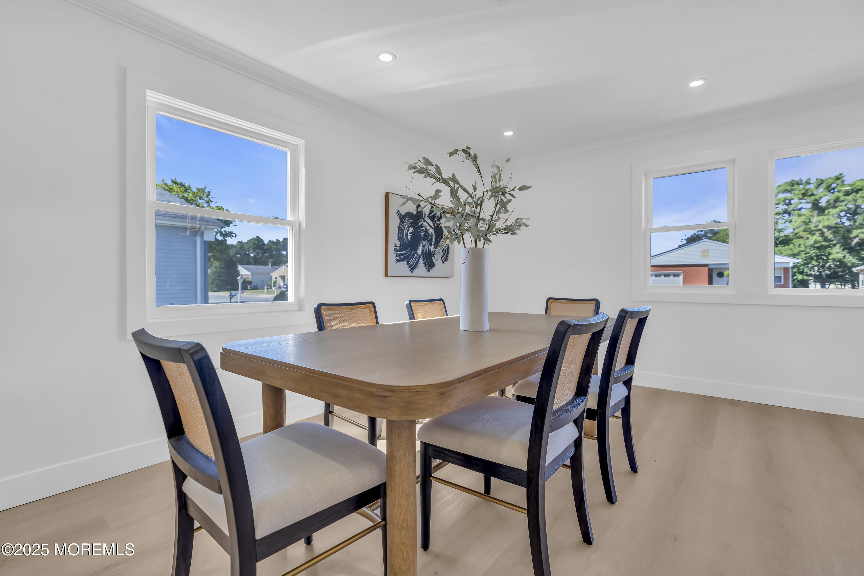 143 Davenport Road Toms River, NJ 08757 - Photo 17 of 42 a view of a dining room with furniture window and wooden floor