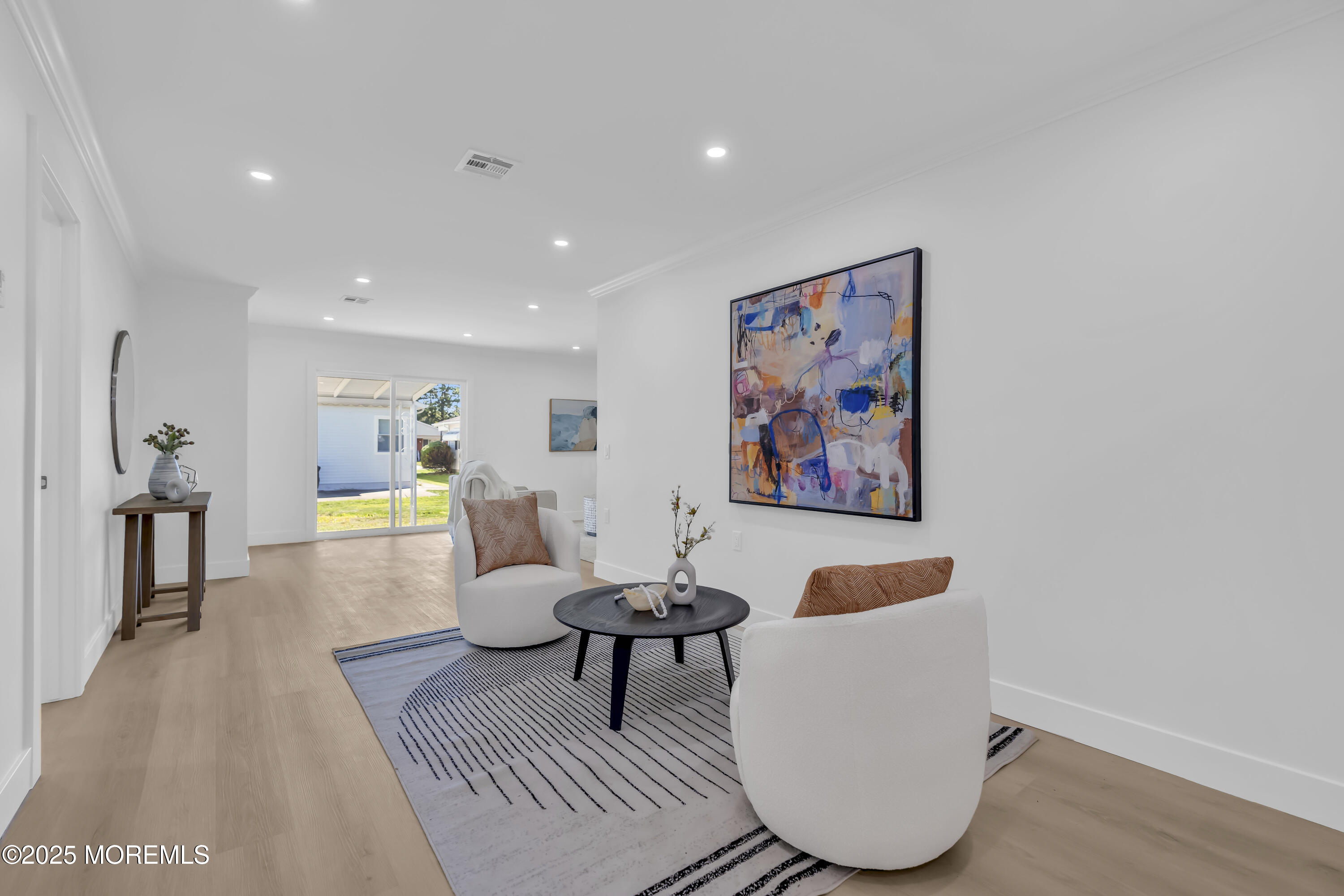 143 Davenport Road Toms River, NJ 08757 - Photo 23 of 42 a living room with furniture and a rug