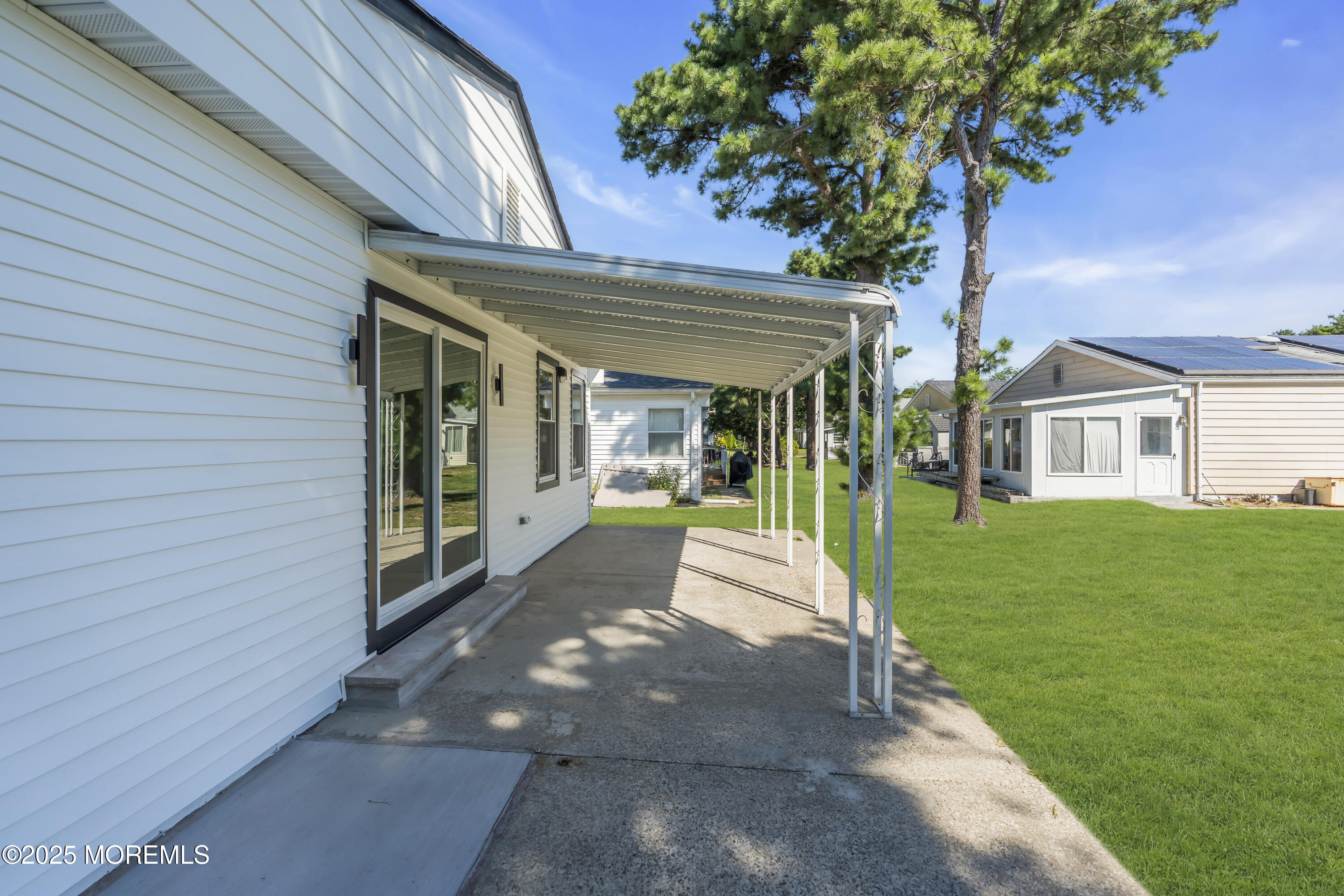 143 Davenport Road Toms River, NJ 08757 - Photo 41 of 42 a view of house with a yard