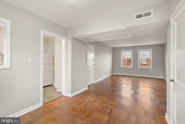 a view of a room that has a window in it