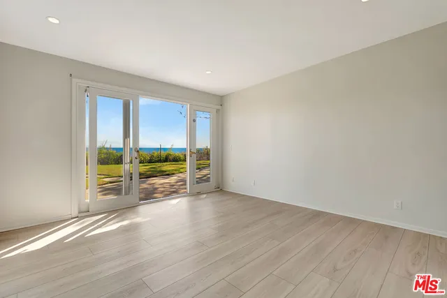 a view of house with outdoor space and garden
