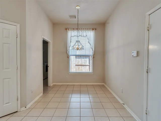 a bathroom with a sink double vanity and a mirror