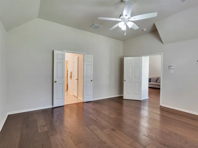 a view of an empty walk in closet