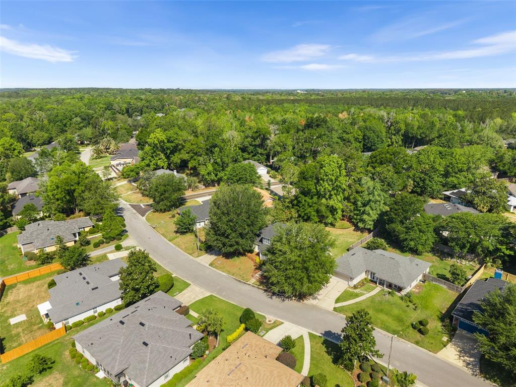 7418 White Oaks Road Alachua, FL 32615 - Photo 46 of 46 an aerial view of residential houses with outdoor space