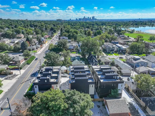 a view of a city with lots of trees