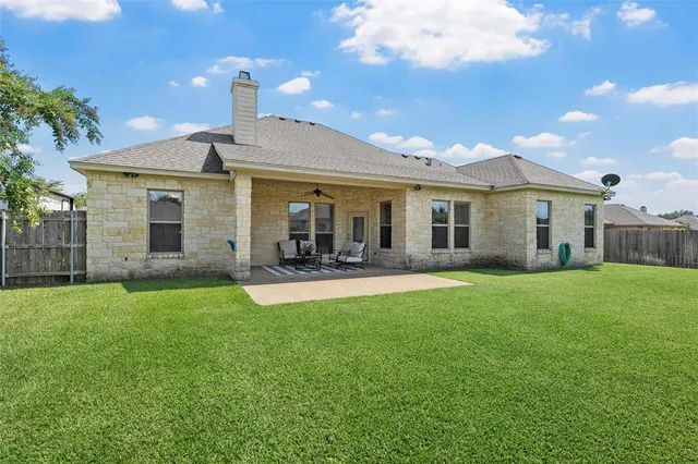 a front view of a house with patio
