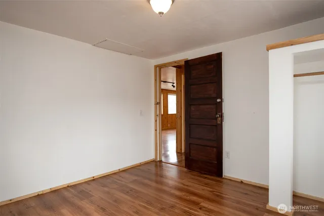 a bathroom with a shower and a toilet
