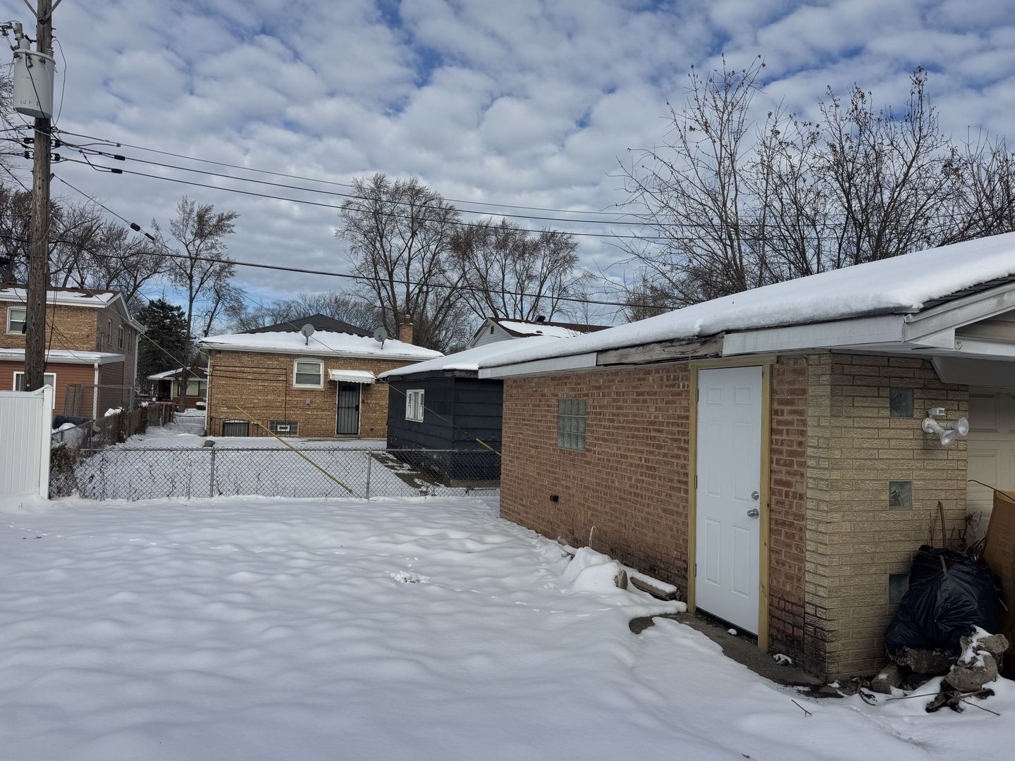 1104 East 156th Place Dolton, IL 60419 - Photo 14 of 14 a view of a house with a backyard