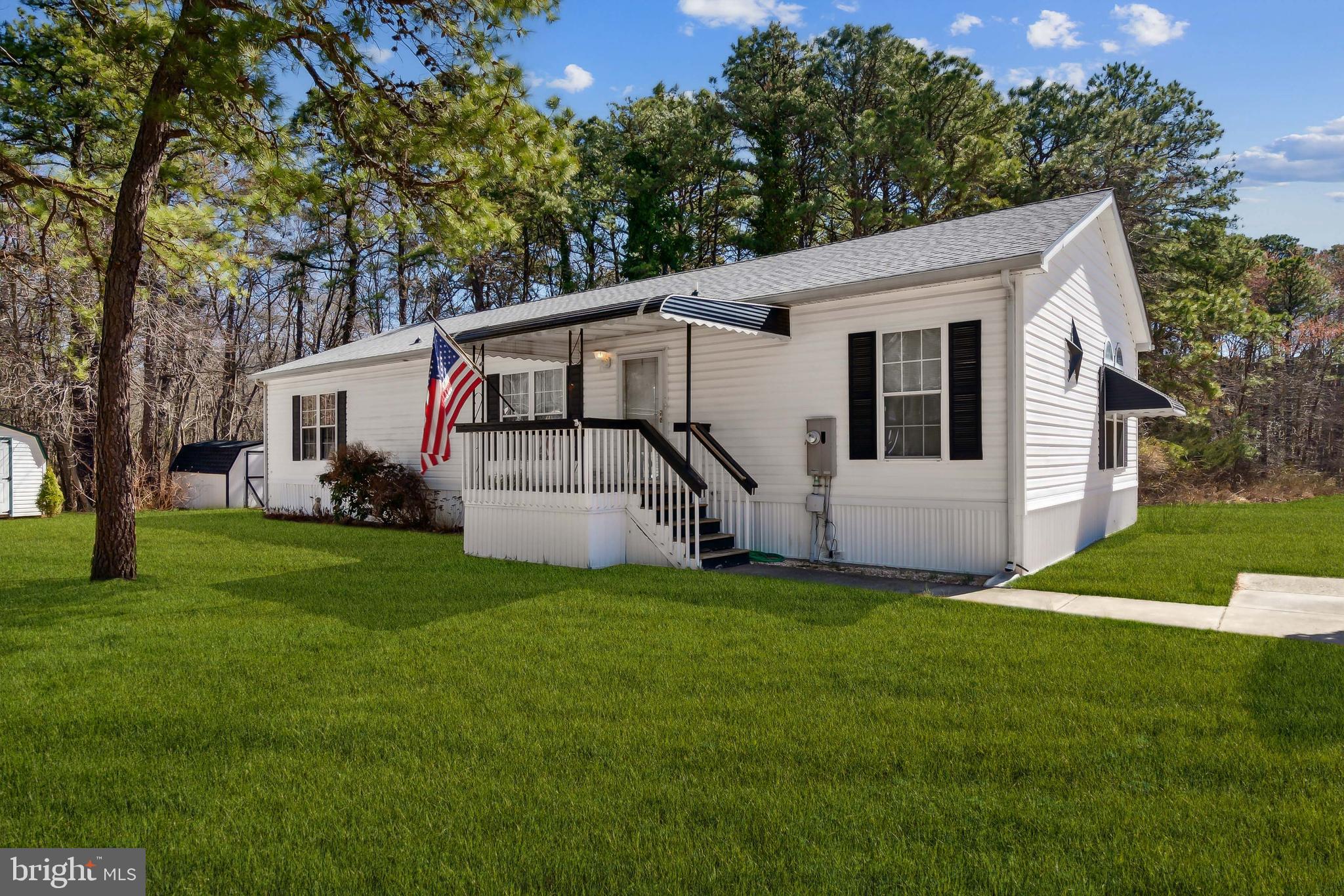 a view of a back yard of the house
