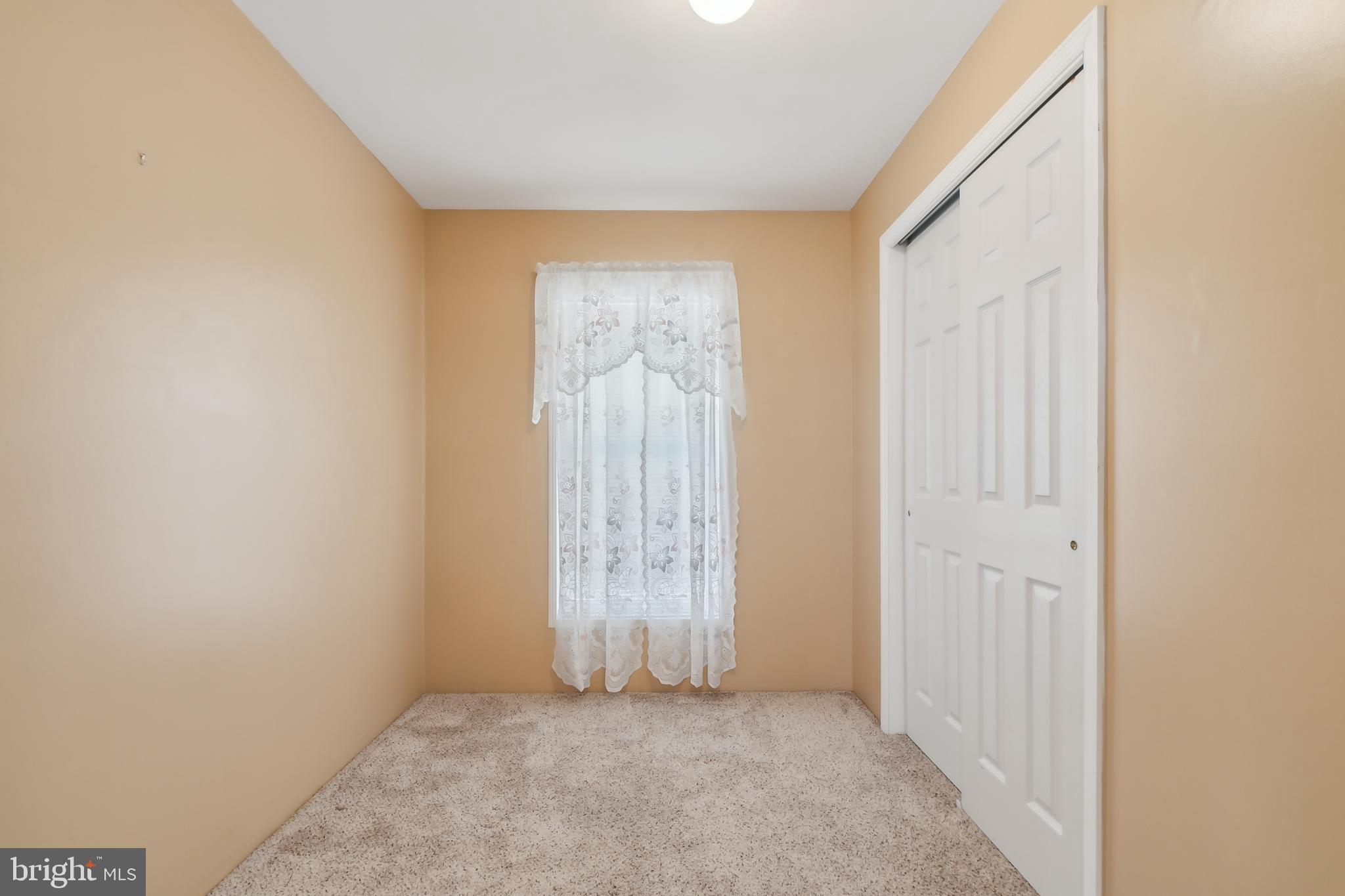 14 Skyline Drive Sicklerville, NJ 08081 - Photo 19 of 25 an empty room with windows