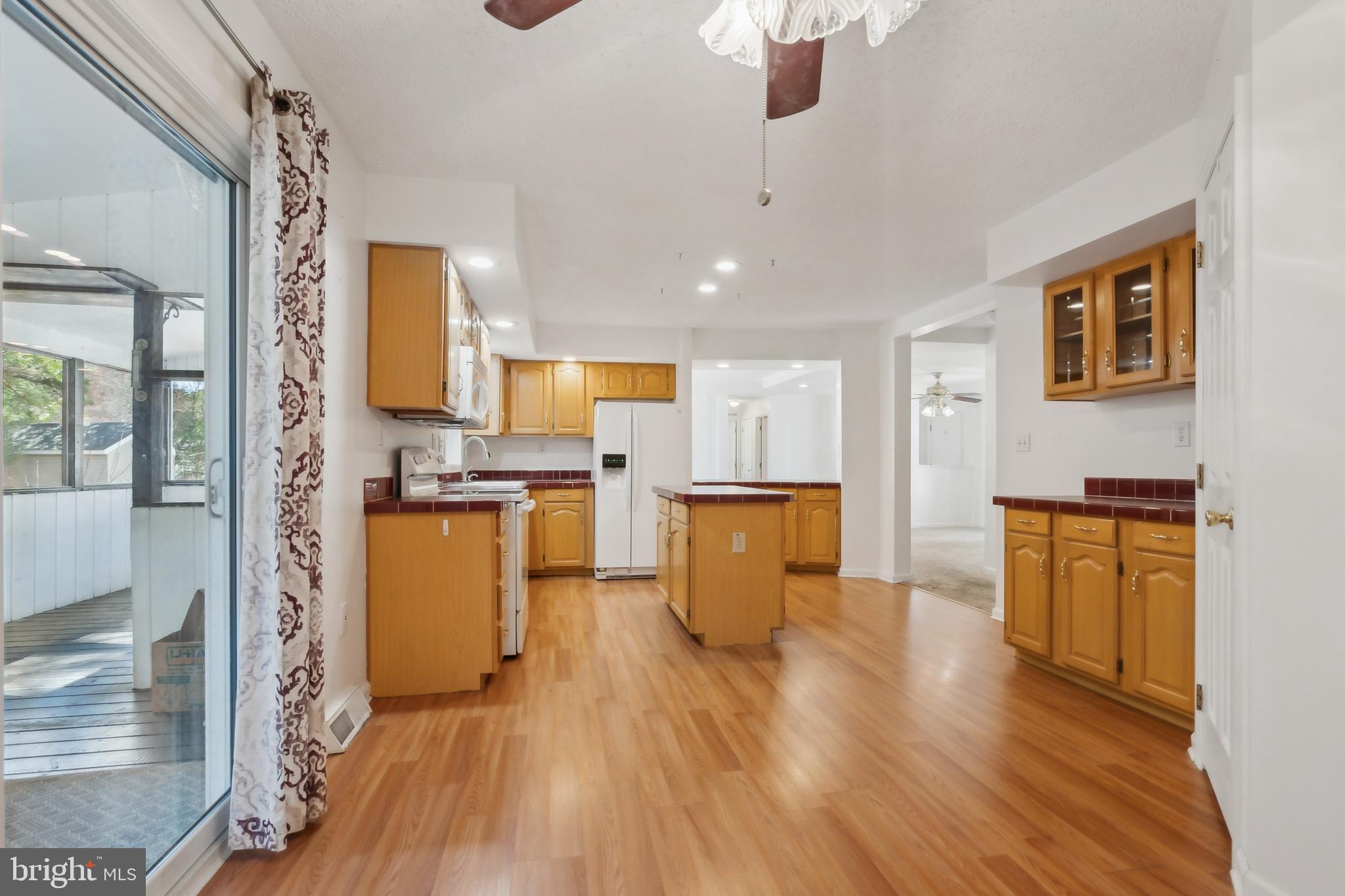 14 Skyline Drive Sicklerville, NJ 08081 - Photo 8 of 25 a view of kitchen with sink and wooden floor
