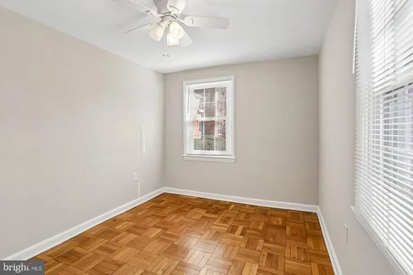 a view of a room with a window