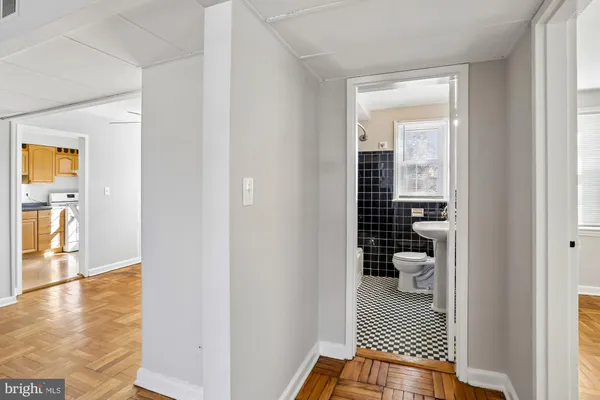a view of a bedroom from a hallway