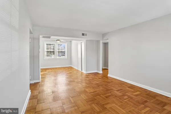 an empty room with windows