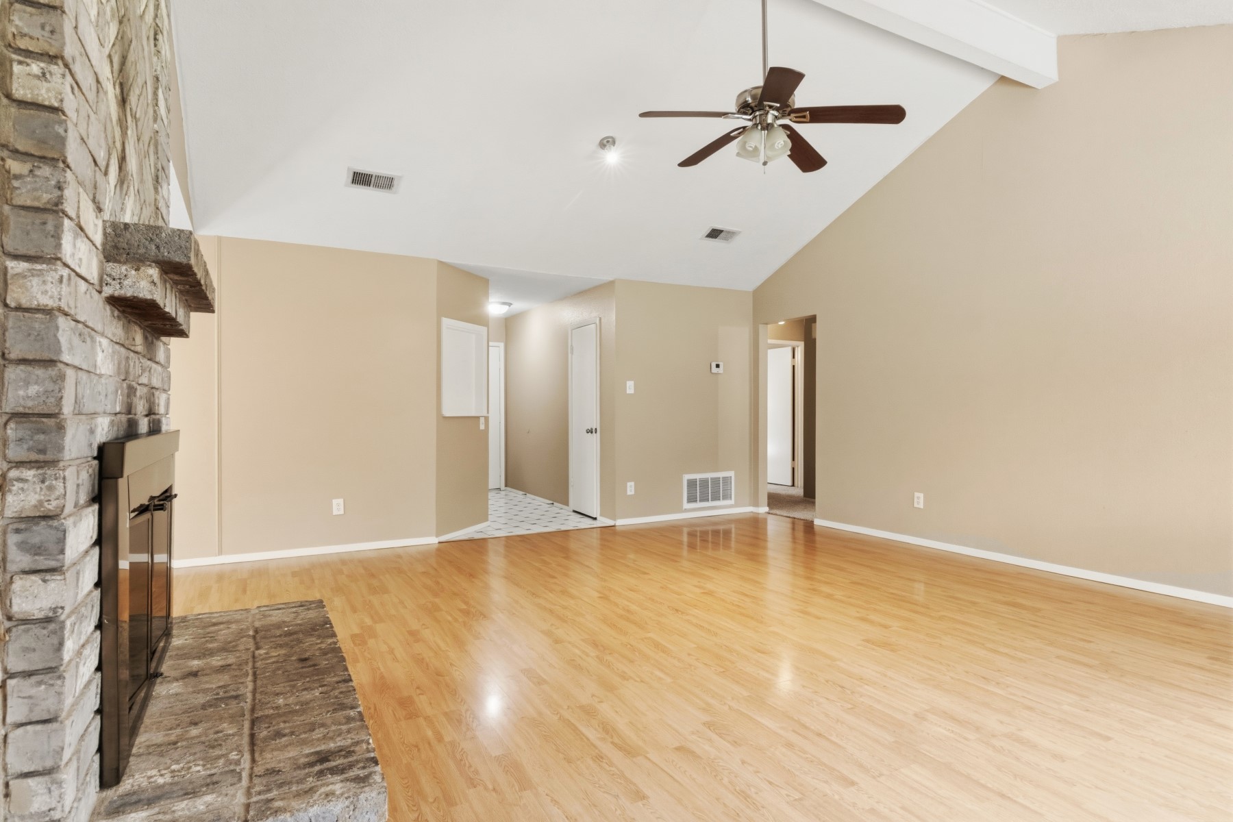 2531 North Spring Drive Spring, TX 77373 - Photo 7 of 24 a view of an empty room with a chandelier fan