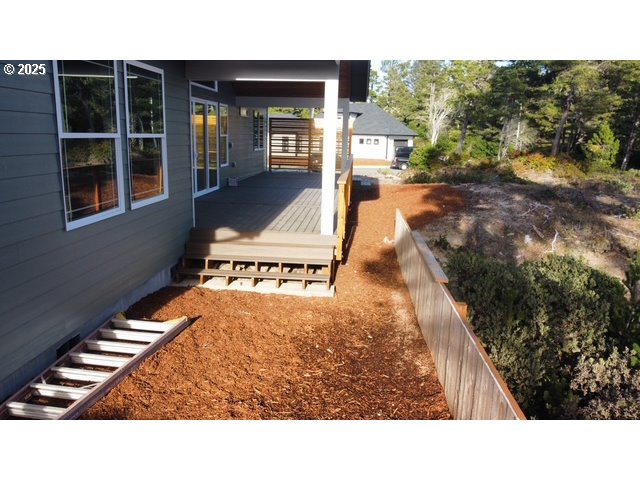 560 Tournament Drive Florence, OR 97439 - Photo 5 of 7 a black and white photo of a house