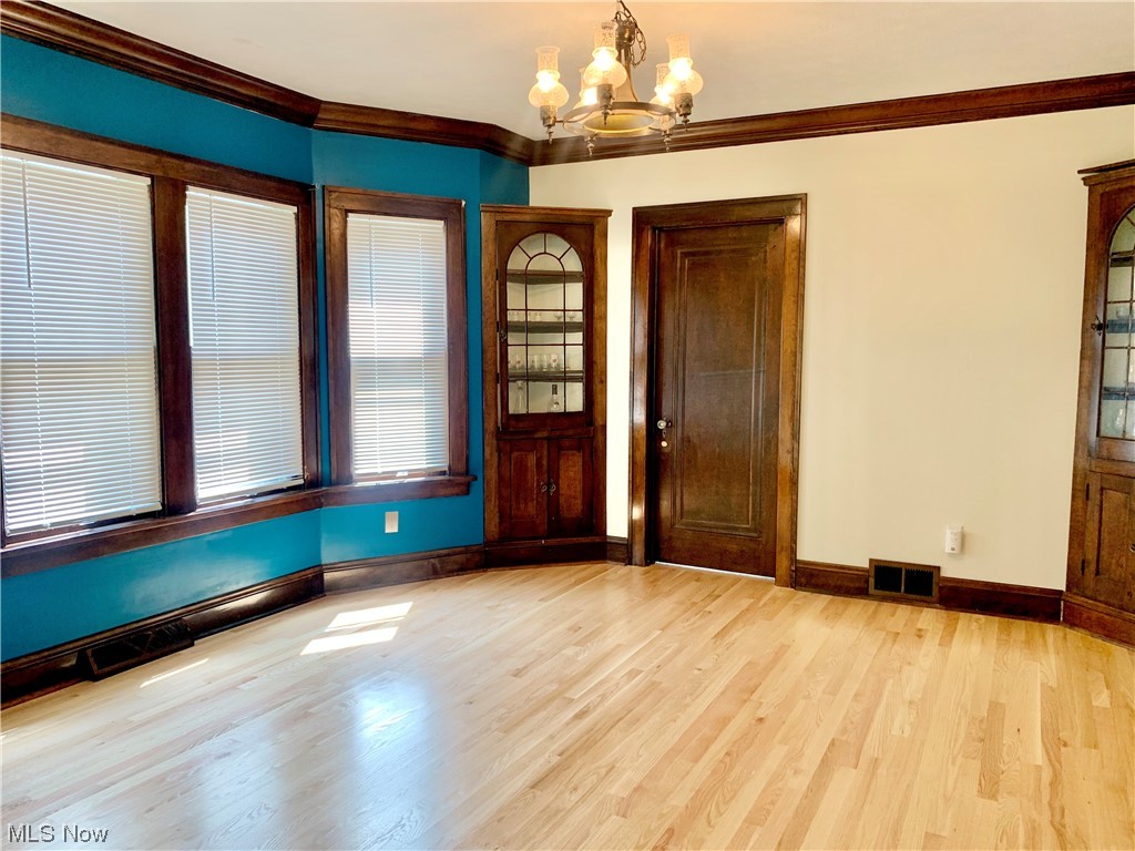 27041 Butternut Ridge Road North Olmsted, OH 44070 - Photo 8 of 28 Dining room with light hardwood floors and crown molding