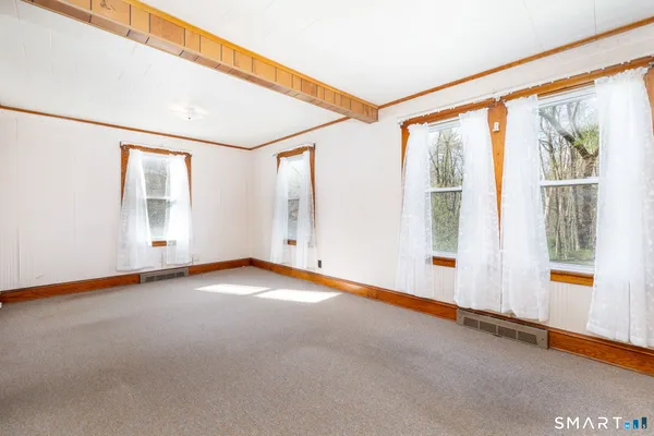an empty room with windows
