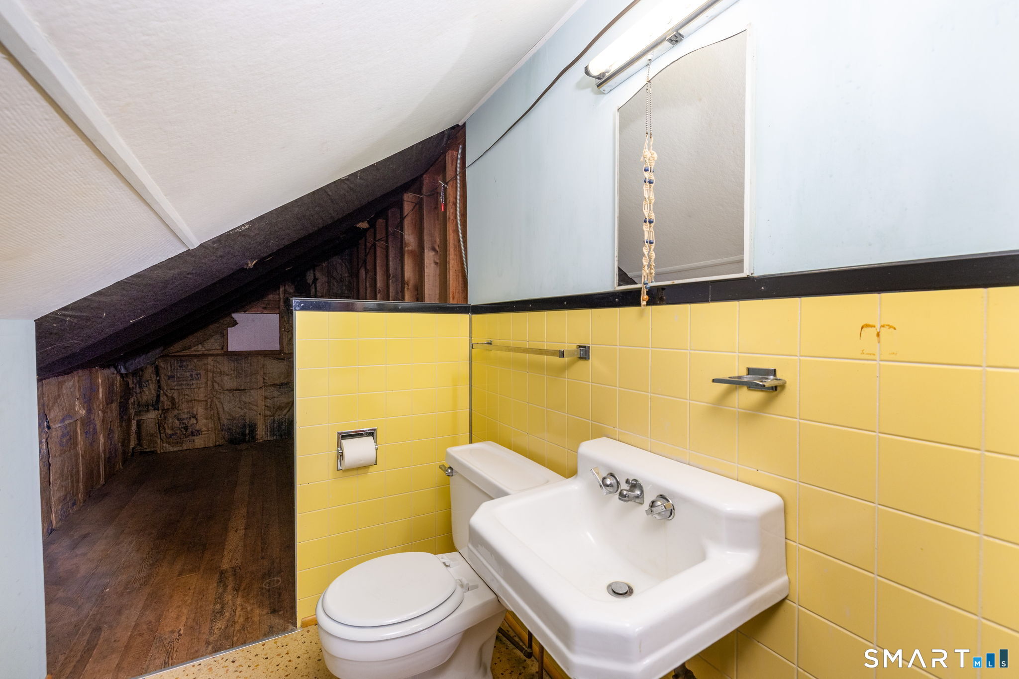 203 Willimantic Road Chaplin, CT 06235 - Photo 22 of 39 a bathroom with a sink mirror and toilet