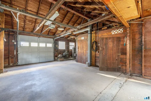 a view of a room with wooden walls