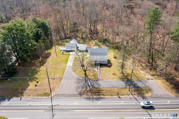 a view of yard along with trees