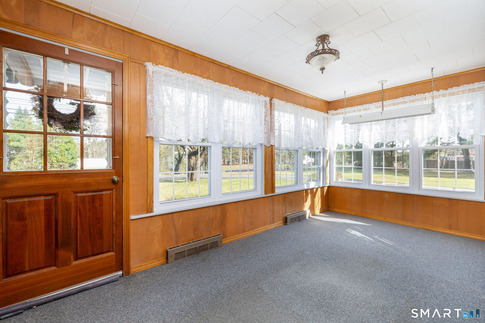203 Willimantic Road Chaplin, CT 06235 - Photo 4 of 39 a view of an empty room with a window