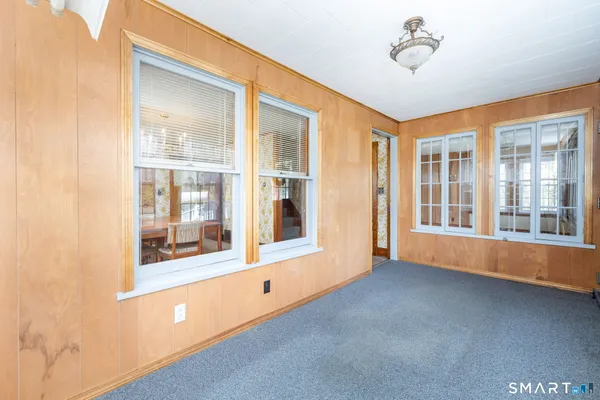 a view of an empty room with a window