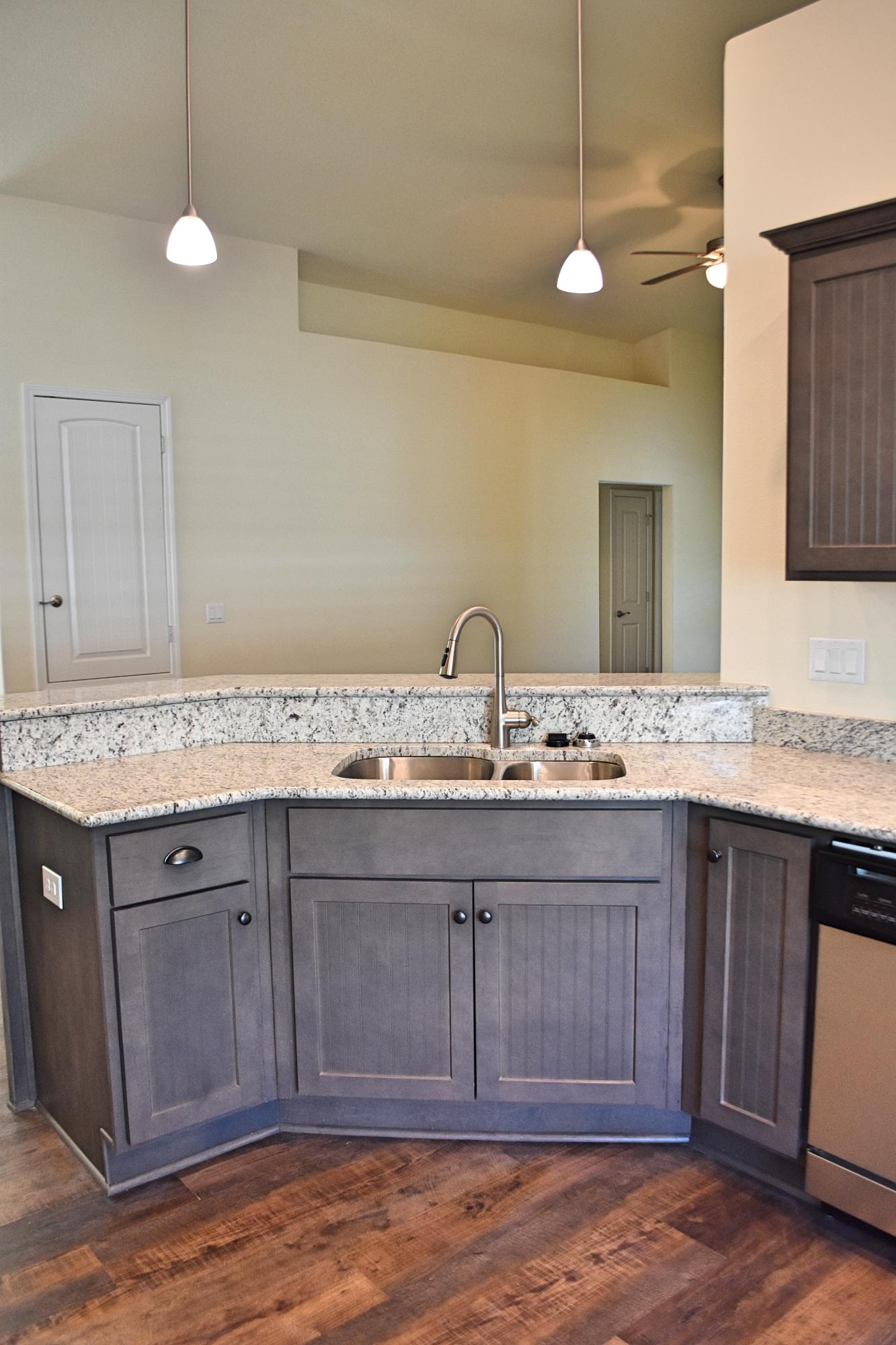 211 Brandywine Road Freeport, FL 32439 - Photo 14 of 37 a bathroom with a granite countertop sink and a mirror