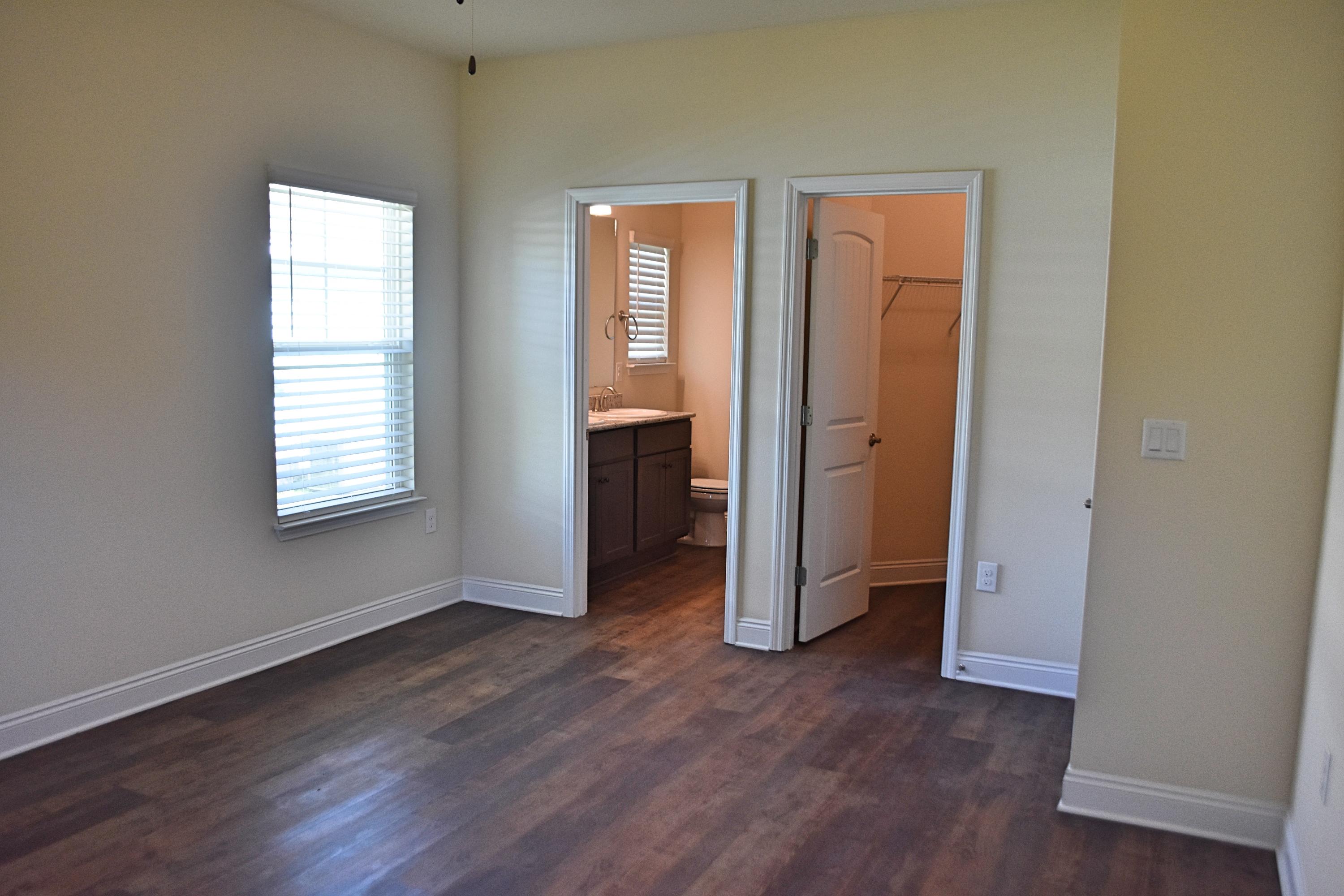 211 Brandywine Road Freeport, FL 32439 - Photo 28 of 37 an empty room with windows and closet