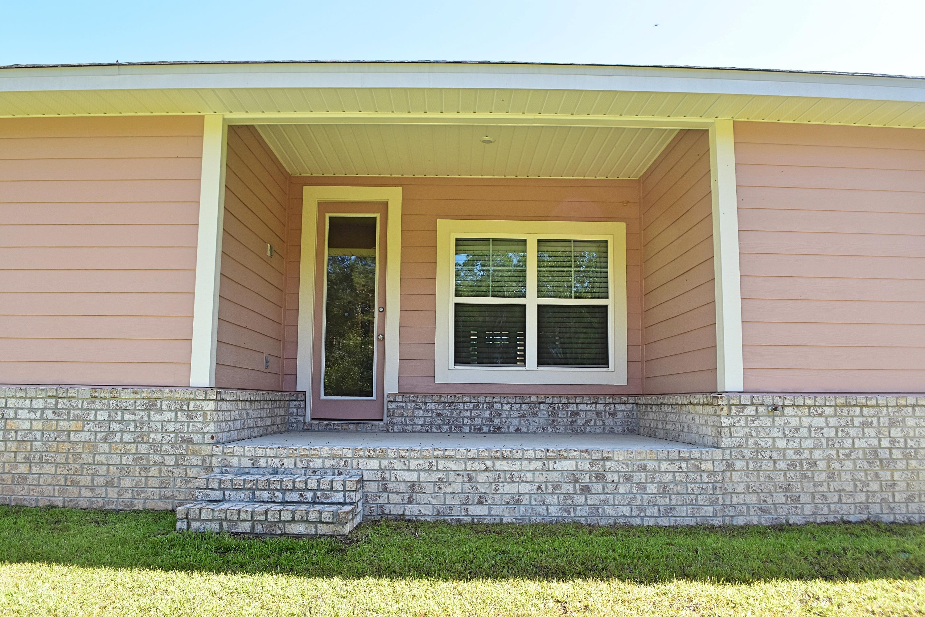211 Brandywine Road Freeport, FL 32439 - Photo 34 of 37 a front view of a house