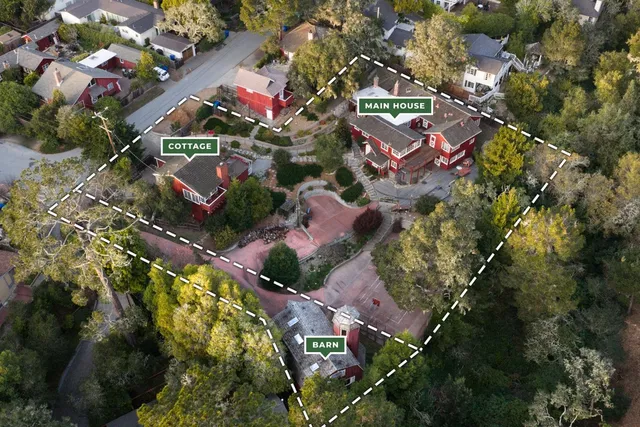 an aerial view of house with yard