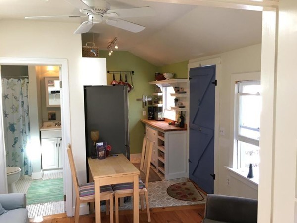74 Hay Road, Unit 74 Eastham, MA 02642 - Photo 8 of 21 a dining room with furniture and window
