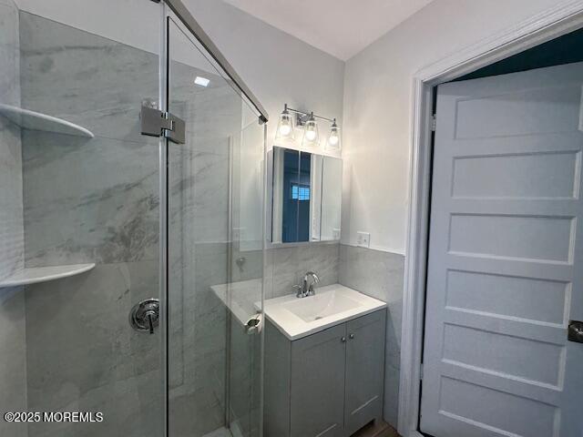 316 Spier Avenue, Unit 1 Allenhurst, NJ 07711 - Photo 9 of 9 a bathroom with a sink and mirror