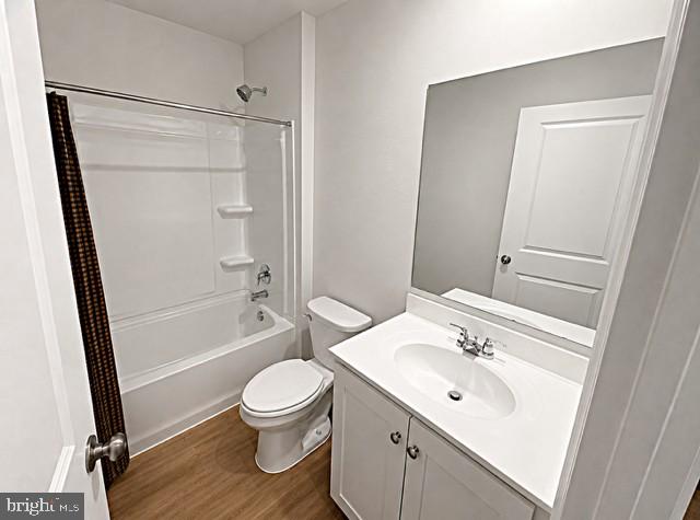 17854 Meriwether Lewis Street Ruther Glen, VA 22546 - Photo 21 of 35 a bathroom with a sink a toilet and shower