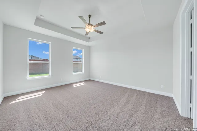 a view of empty room with windows