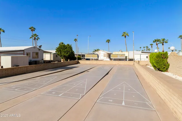 a view of a chairs and tables in the patio