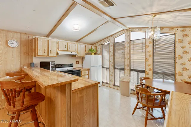 a kitchen that has a cabinets counter space and appliances