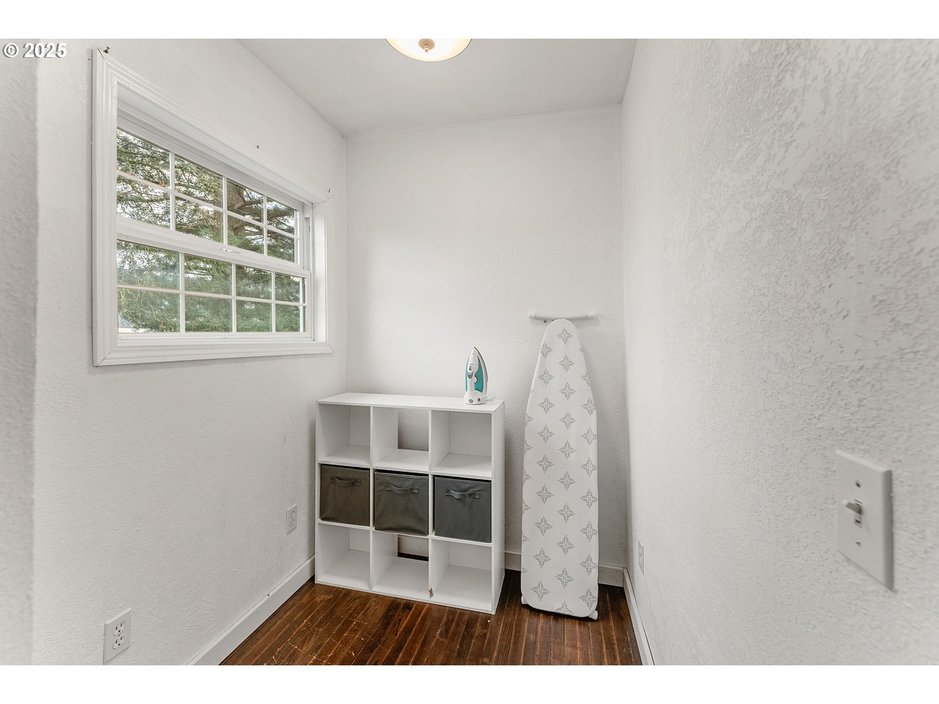 523 West Broccoli Street Roseburg, OR 97471 - Photo 25 of 43 a view of wooden floor and windows in a room