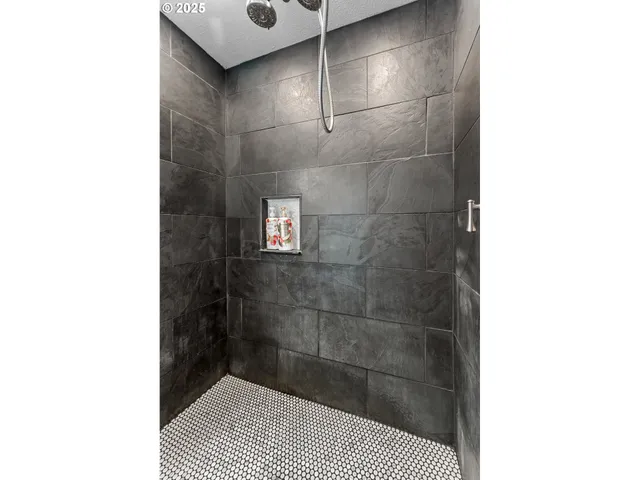 a bathroom with a sink and a shower