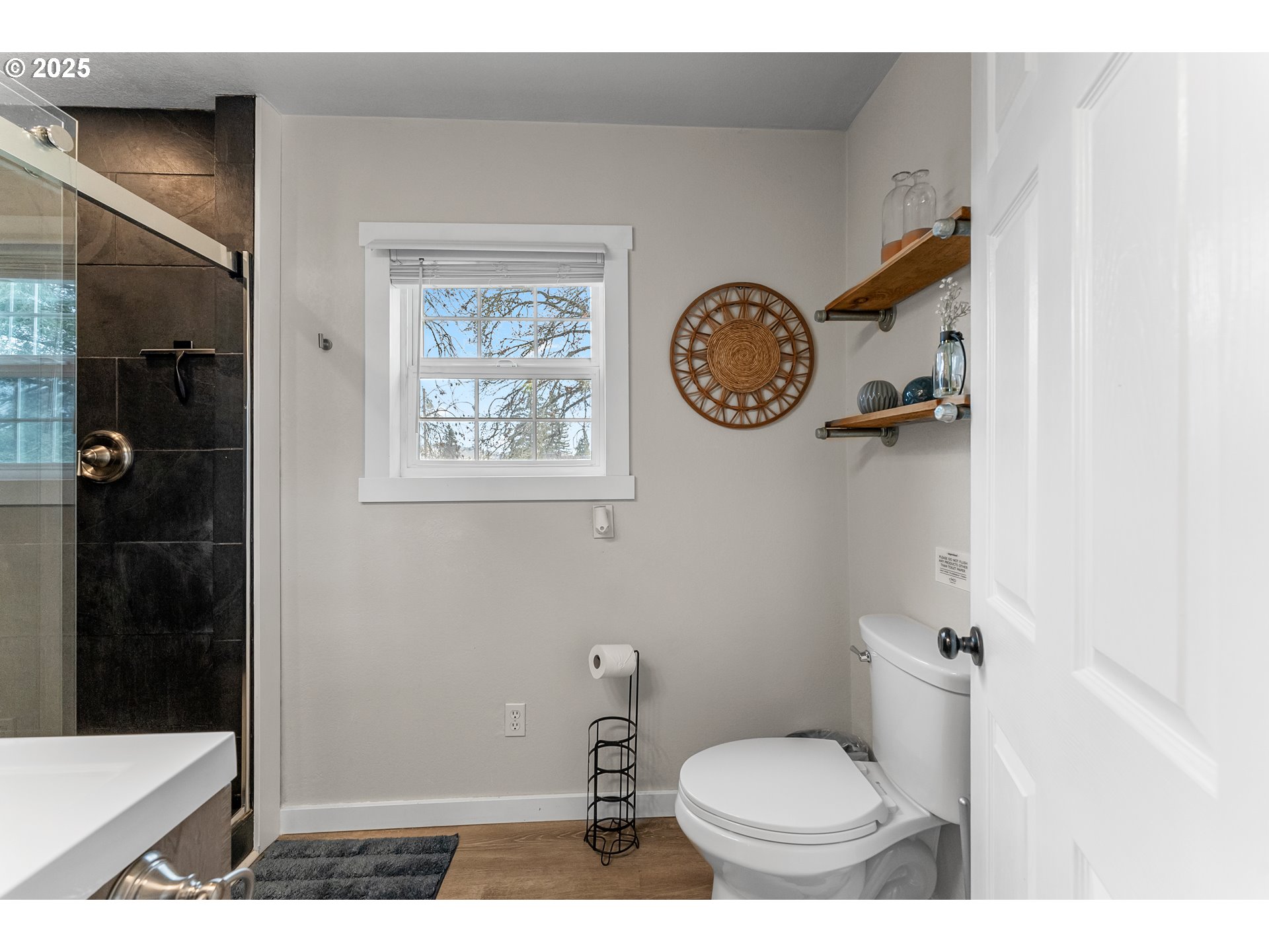 523 West Broccoli Street Roseburg, OR 97471 - Photo 32 of 43 a bathroom with a toilet and a shower