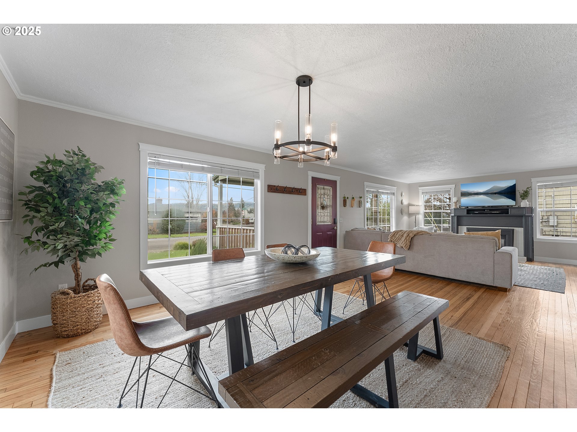 523 West Broccoli Street Roseburg, OR 97471 - Photo 10 of 43 a view of a dining room with furniture window and wooden floor
