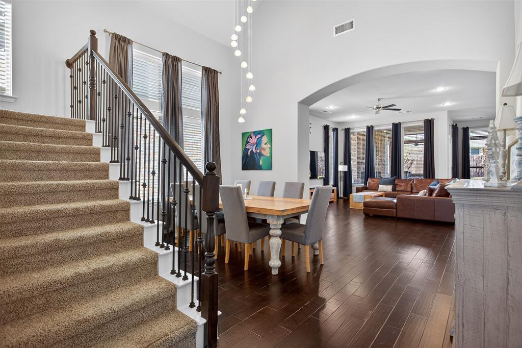 1010 Longhill Way Forney, TX 75126 - Photo 12 of 38 a view of a livingroom with lots of furniture and hardwood floor