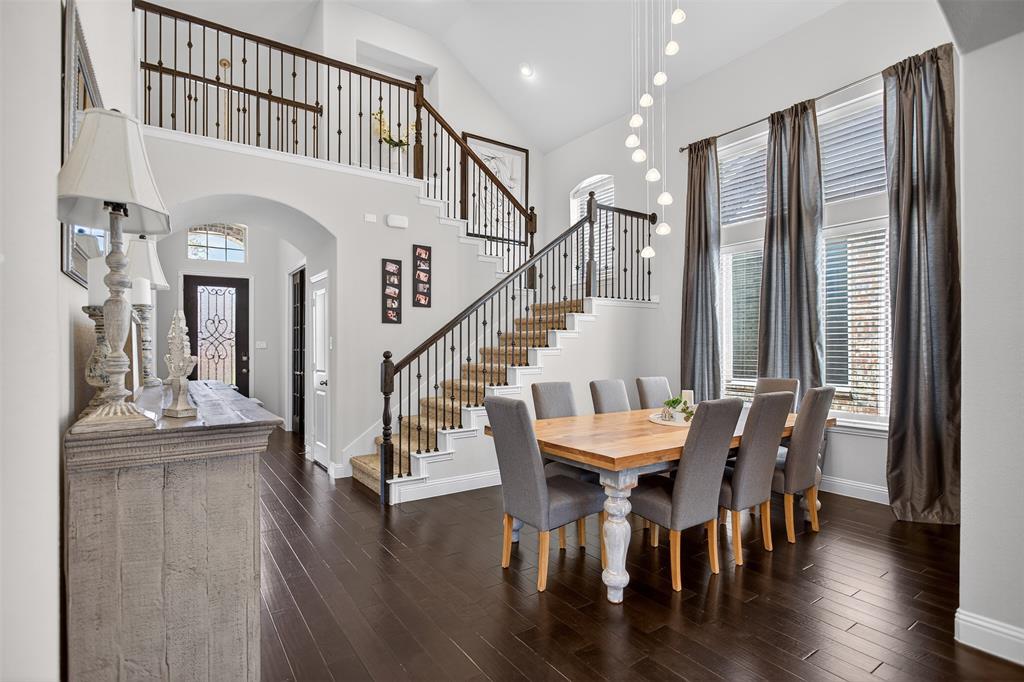 1010 Longhill Way Forney, TX 75126 - Photo 13 of 38 a view of a dining room with furniture window and wooden floor