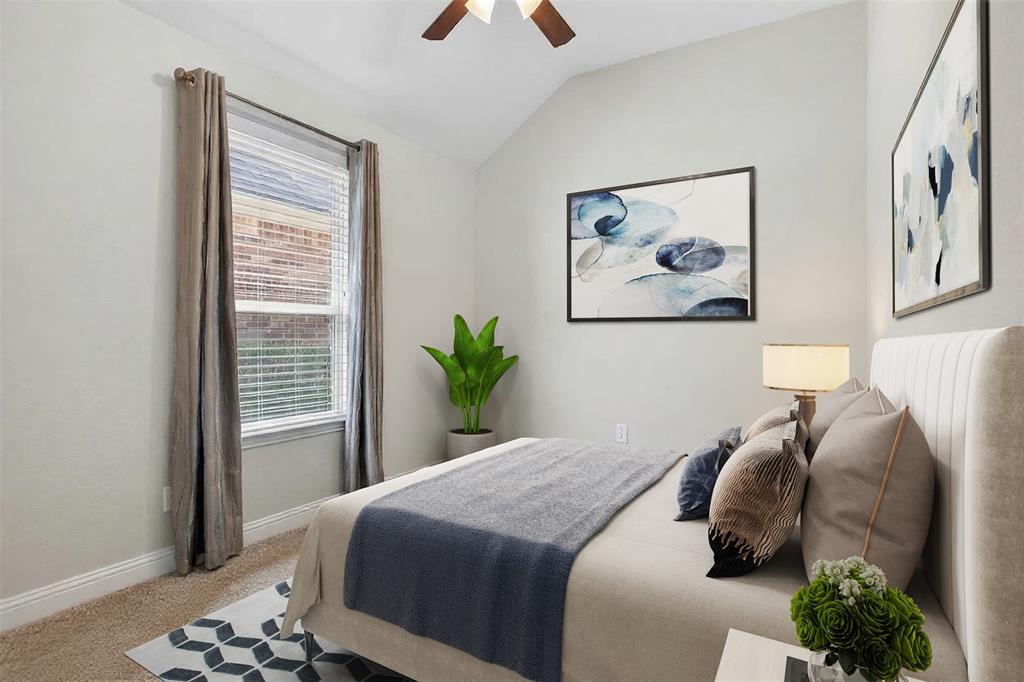 1010 Longhill Way Forney, TX 75126 - Photo 20 of 38 a bedroom with a bed and a painting on the wall